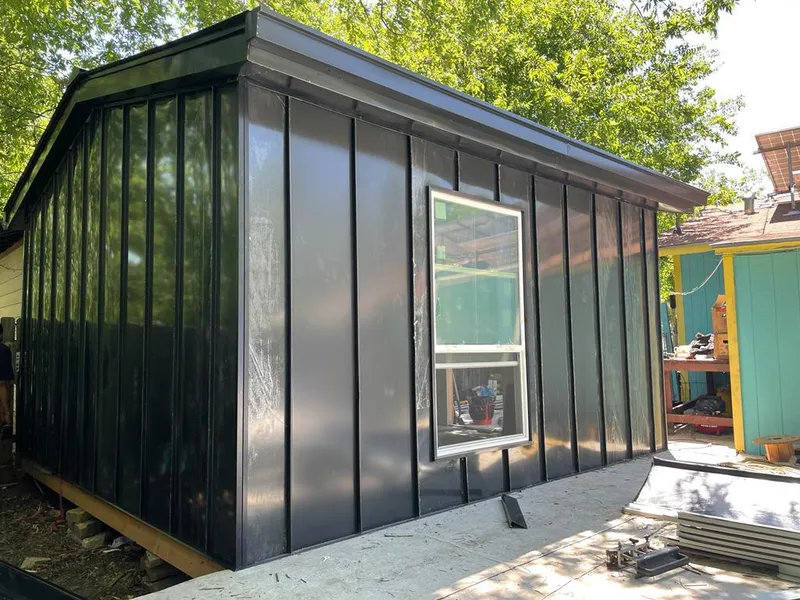 Black standing seam metal wall panels for Metal Roof Installation in Cohoes